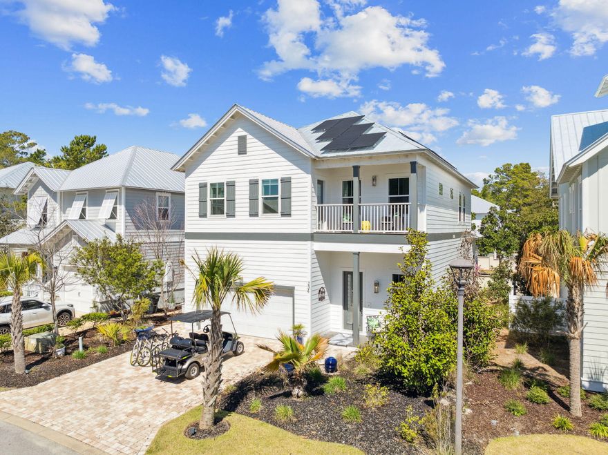 Stunning Coastal Retreat in Grande Pointe - Inlet BeachPRICED TO SELL!!!!  Discover this exceptional 5-bedroom, 3.5-bath home in the highly sought-after Grande Pointe neighborhood of Inlet Beach. Showcasing superior craftsmanship and thoughtful upgrades, this residence offers both beauty and efficiency, thanks to solar panels that of which have been paid in full, ensure remarkably low power bills. A home warranty is also included for added peace of mind.Step inside to find raised ceilings, rich wood floors, an open-concept layout, and charming shiplap accents. The gourmet kitchen features a gas cooktop, built-in wall oven, stainless steel appliances, and gleaming granite countertops--perfect for hosting and everyday living. The primary suite is conveniently located on the main level, just off the living area, offering privacy and comfort. Upstairs, you'll find four spacious guest bedrooms, including two that share a stylish Jack and Jill bathroom. A second living area on the upper floor provides additional space for relaxation, entertainment, or family gatherings. 

Grande Pointe is a waterfront community on Lake Powell, mere minutes from 30A's world-famous beaches, dining, and shopping. Residents enjoy exclusive access to a clubhouse, community pool, and a dock, ideal for paddleboarding, kayaking, and all your waterfront adventures.  The beach access is only a couple miles away!

This home is being sold turnkey fully furnished, solar panels are paid off in full, 6 seater golf cart included with an acceptable offer!

Don't miss this opportunity to own a beautifully maintained home in one of Inlet Beach's most desirable neighborhoods. 
Call today to schedule your private showing!
