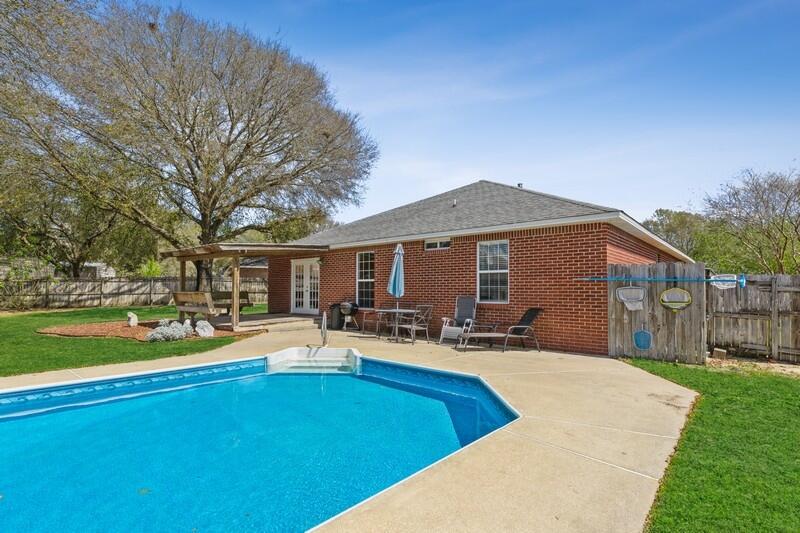Join us for OPEN HOUSE this Saturday 4/23 2-5pm! You don't want to miss this beautiful, newly renovated POOL home in South Crestview! BRAND NEW HVAC, 2011 ROOF, 2014 HOT WATER HEATER, BRAND NEW ELECTRIC PANEL BOX 2021, BRAND-NEW STAINLESS-STEEL FRIDGE, fresh paint throughout, and a stunning kitchen remodel this past year that offers granite countertops, brand new cabinets, and new backsplash! Who won't love sitting under the beautiful, covered porch and relaxing in the nice POOL!