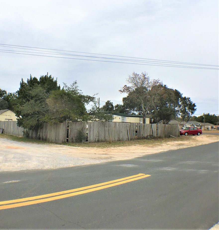 ENDLESS POSSIBILITIES ! Calling all builders or investors. Check out this Multi-use property zoned R-2 just 6.5 miles from Hurlburt AFB. Six Impact Fees/Tap fees have already been paid for. Build multiple single family homes, multiple townhomes or develop this into a nice trailer park. Comprised of three lots that are currently leased by one trailers for $300.00 per month. Seller does own one of the trailers that has been on the property for many years. Seller is willing to do owner financing. Call today for more information and drive by the property to check it out.