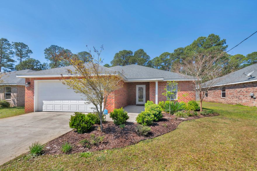 Beautiful home nearly new construction (2013) available now! This 4 bedroom 2 bath home with a 2 car garage is located on a quiet cul-de-sac in Mary Esther minutes from Hurlburt Field, popular Navarre & Fort Walton Beach Beaches, Shopping & Dining! This open design concept offers Pergo Wood & Modern Tile throughout the home, granite kitchen with designer cabinets, separate pantry, breakfast bar and stainless steel appliances. The spacious master suite offers a walk in closet & a double granite vanity in the master bath. This home has spacious bedrooms, a lovely laundry room & tons of storage! Take a look at this back yard space, fully fenced in and backs up to the reserve. Call today and you can start enjoying your summer evenings on this screened porch!