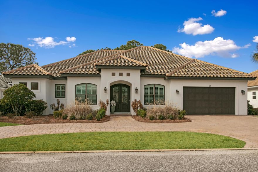 JUST REDUDUCED!   Exquisite!! Fully updated Mediterranean home with bay views on the 17th fairway in the gated community of Emerald Bay. Rare opportunity to own a newer home with an open concept floor plan 3 bedrooms with a den/4 bedroom sprawling across one level creating an impeccable living experience. Entertain guests in the outdoor oasis featuring a pool, spa, outdoor shower, fireplace, and summer kitchen all covered under a lanai. Retreat inside to the state-of-the-art chef's kitchen with new appliances, DOUBLE gorgeous granite & Italian pebbled tiled islands, double ovens, a commercial ice machine, a 5 burner gas range, a stainless Farm sink, AND a BUTLER'S PANTRY!