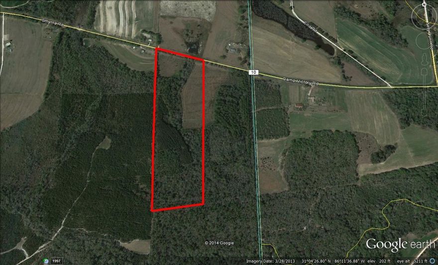 29.5 Acres. West half of Parcels 233001010000005.002 and 233001120000001.000Paved road, Field, mature oaks,deer and turkey! Bring you house plans or your deer stand! Plenty of room for horses!
