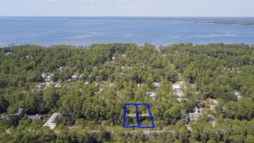 MOTIVATED SELLERS! Two beautiful lots adjacent to each other in Point Washington, with all studies completed, tap fees paid and ready for you to build your dream home! Located in a very quiet area, only a few blocks from the bay and in Flood Zone X. The property was recently forestry mulched, leaving several beautiful magnolia and pine trees. Each lot is approximately .17 acres and measures 50' x 150'. Don't miss this opportunity!