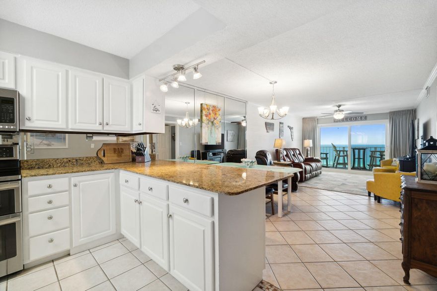 Fully furnished move in/rental ready 2bed 2bath Gulf Front facing residence with many updates!  Featuring spectacular Gulf views with access to the balcony from both the master bedroom and the living room.  New windows & doors, walk in master shower, new bathroom vanities, quality plantation shutters, water filtration system, fresh paint, refaced cabinets, granite countertops, stainless steel appliances, double oven, quality leather dual reclining sofa, tongue&groove wall accents, crown moulding throughout, tile & wood laminate flooring, washer/dryer,  and quality patio furnishings! Perfect for a primary, vacation or income producing rental property.  Regency Towers' fantastic amenities include two olympic size pools- one heated year round, a full service poolside tiki bar & grill,