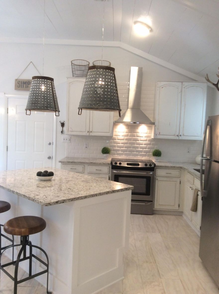 An amazing little cottage renovated by a designer. White washed floor marble bathroom huge lot with room for expansion. Water views from the end of the driveway. A kitchen that you dream of with a beautiful office area and dining room. Extensive woodwork added with all new appliances.