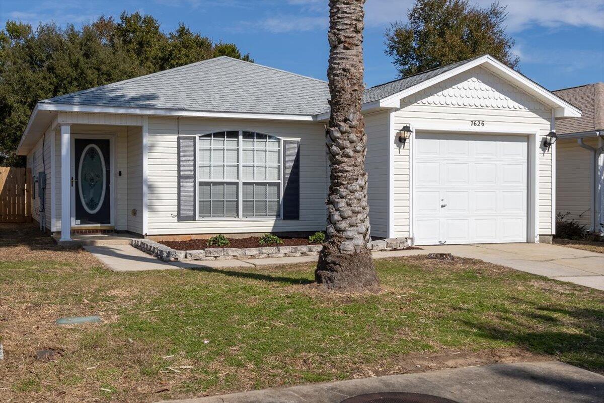 Welcome to this charming 3 bedroom, 2 bathroom Florida cottage with a 1-car garage in a no-HOA neighborhood! This home features LVP and tile flooring throughout, so there is no carpet to worry about. The kitchen features granite counters and stainless steel appliances. There is a dual vanity with granite in the primary bathroom, along with a walk in closet. Enjoy outdoor privacy in the fully fenced backyard. The freshly painted interior adds a modern touch. Conveniently located near grocery stores and restaurants, too!