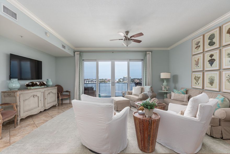 One of the best views in Destin day or night! Private GARAGE and STORAGE CLOSET! Water views from every window and balcony! This Holiday Isle unit has all you dreamed and more. The balcony and the open concept floor plan make this unit ideal for owners who love to entertain friends and family, and imagine the personal enjoyment of the glorious views this home offers. Take a taxi boat to your favorite restaurants. Boat slips available to rent.