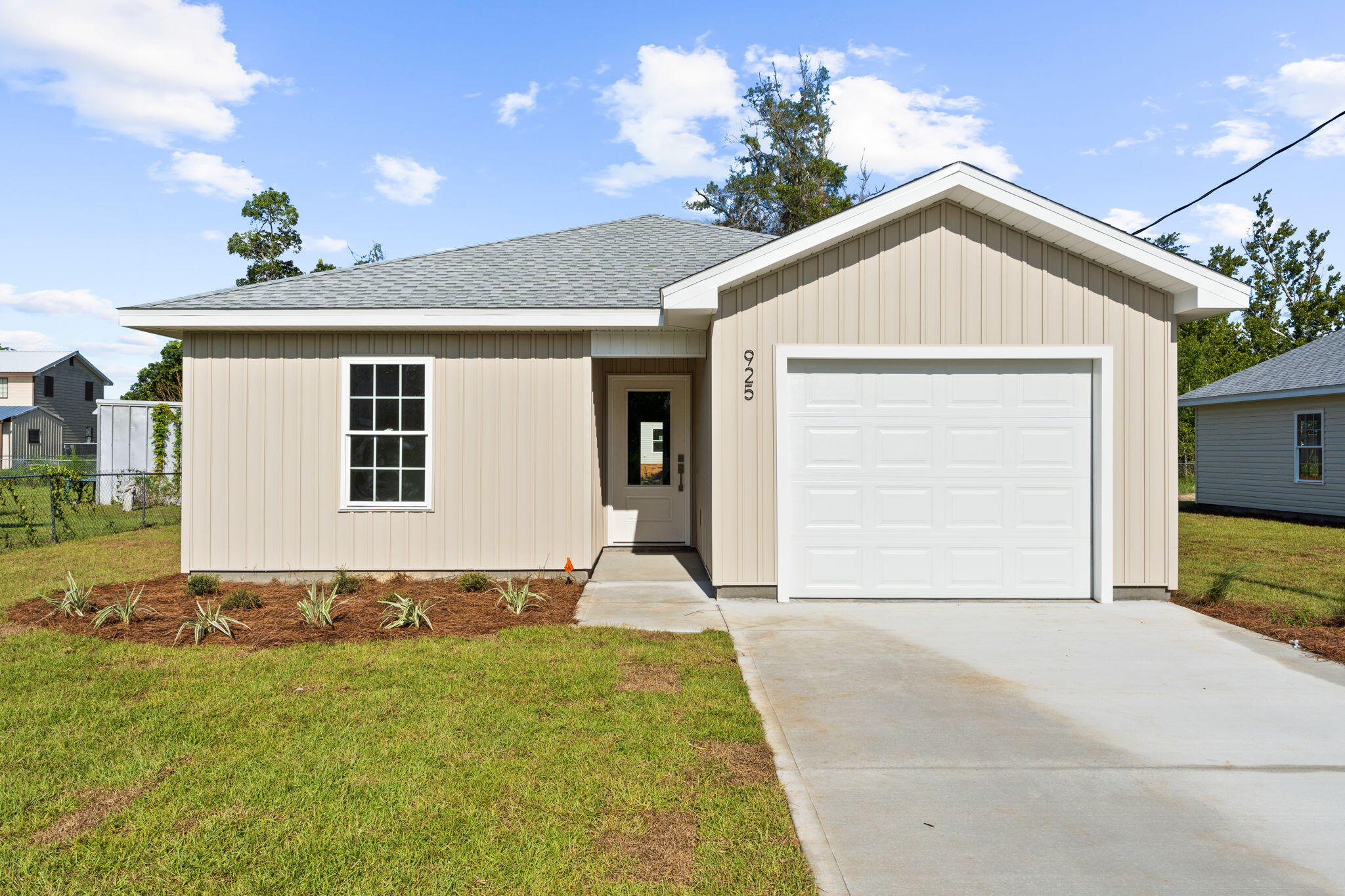 Brand new and built to impress - welcome to 925 Bonnie Lane! This thoughtfully designed home in Panama City is a smart move for anyone looking for quality, comfort, and convenience. Just minutes from Tyndall Air Force Base, public boat ramps, parks, and all the essentials of town, this location offers the best of both peace and practicality. Step inside to vaulted ceilings, tons of natural light, and an open-concept layout that feels spacious yet inviting. The kitchen delivers serious style with sleek quartz countertops, stainless steel appliances, soft-close shaker cabinets, and a large island perfect for hosting or your morning coffee routine. Durable vinyl plank flooring runs throughout. No carpet = no stress or mess.