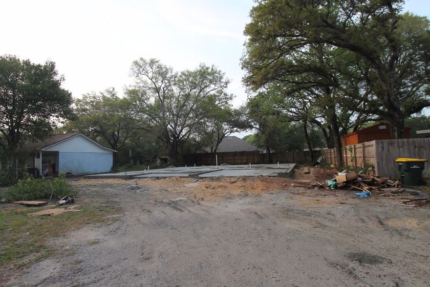 Location, location, location. Golf cart friendly area, minutes to downtown Fort Walton, shopping and beaches.Awesome floor plan by multiple award winning builder!! Contract now to customize!!! This 4/3 custom brick home has super curb appeal. There are 10 Ft. Ceilings w/ impressive crown molding, will have hand crapped hardwood flooring, and 5 1/4'' baseboard throughout the main living areas. As you enter the home through the covered front porch, the formal dining room is on your right. As you continue down the hallway, you will then enter the chef's delight kitchen which will boast custom maple cabinetry, granite countertops, 2 large pantry's, and stainless appliances (including an oversized commercial grade frig./freezer). This plan is a split bedroom, where bedrooms 1 - 3, and baths 1 and 2, are located at the right of the home. The master suite is in the rear of the home, is very roomy, has 2 large walk - in closets, a custom tiled walk - in shower with class enclosure, a whirlpool garden tub, a double vanity and a linen closet. The laundry room is conveniently located at the rear of the kitchen. The oversized greatroom is located at the front of the kitchen, and opens to a covered porch, which is perfect for entertaining. The yard will be beautifully landscaped, have a privacy fence, and comes complete w/ a well, sprinkler system and timer. Insurance will be very reasonable, as home is built to today's code. Home has a Taexx ''in the wall'' pest control system, that is serviced from the exterior of the home, for owner's convenience. Completion is expected in Late June... 