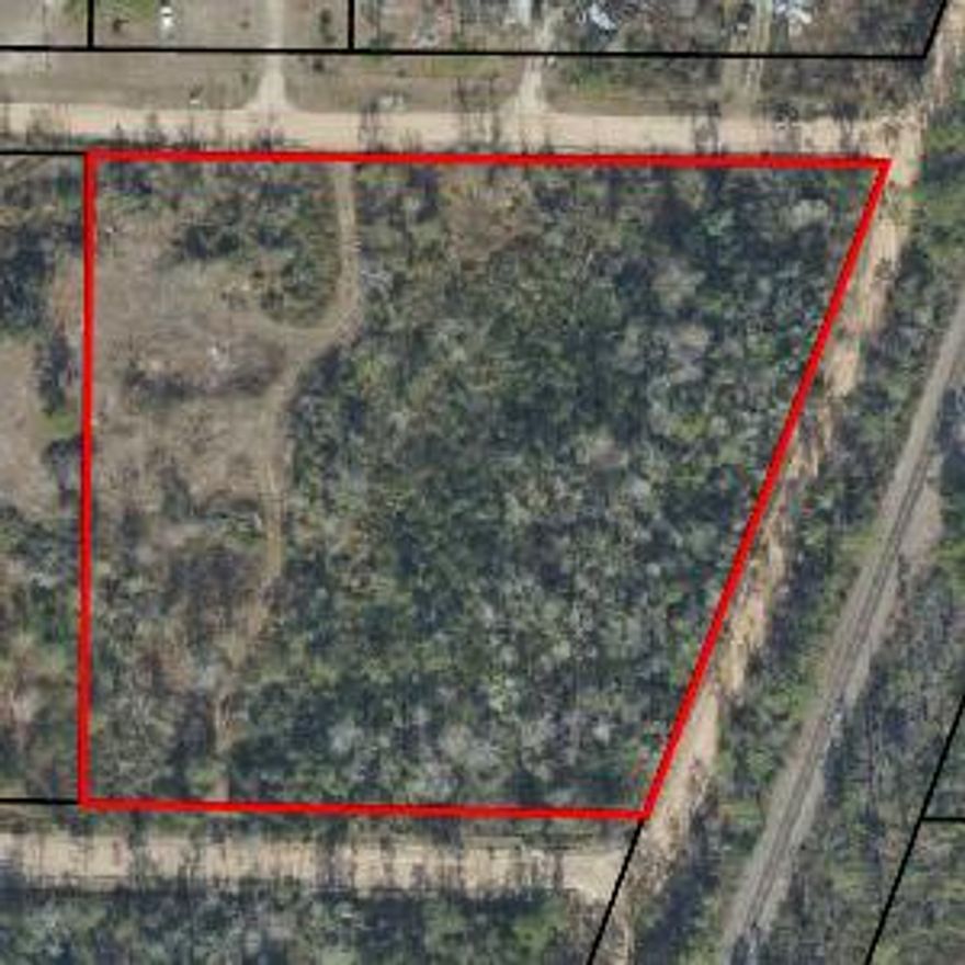 3.7 acres near major public roadway. Partially cleared lot and immediately available.