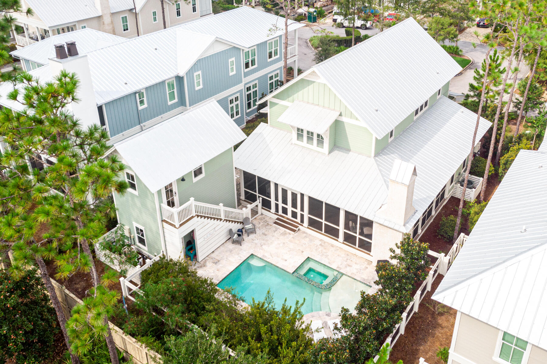Imagine enjoying a WaterColor lifestyle from this five-bed, five-bath home with a beautiful pool and carriage house. No compromises are required in this luxury vacation home which has a proven rental history for those looking for an attractive return. Rich hardwood flooring sets the tone for a modern home with shiplap walls and many added extras. The L-shaped open living space flows through a formal dining area to the light filled open-concept kitchen with marble countertops and large island. An undercounter wine refrigerator keeps chilled drinks handy and there's an impressive wet bar with icemaker, ensuring a smooth operation. Step through French doors into the deep wraparound screened porch with lovely coquina shell fireplace and absorb the peaceful atmosphere while sipping your...