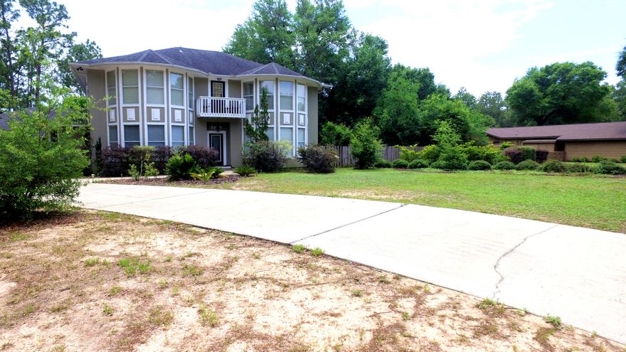 Come see and experience this gorgeous 5 bedroom/3.5bath home with a pool situated on just over an acre. The home features a kitchen with all the amenities - stainless steel appliances, pantry, canned lighting, laminate wood floors, granite counter tops to include a huge granite topped island with a black smooth cook top stove and a gorgeous stone sink. The dining room features plenty of natural light, cherry wood floors, and is large enough to cater to large gatherings. The peaceful first floor master suite features large bay windows for plenty of natural light, will accommodate large furniture, opens up to the master bath featuring a stand alone jetted garden tub, separate shower with his/her showerheads, and has access to the backyard pool area. The four additional bedrooms all