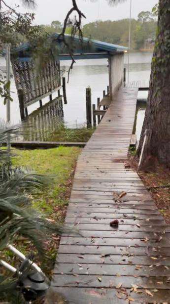 3 bed 1.5 bath home on the water, overlooking the Bayou. The house sits on an elevated lot that is just under 1/2 acre and is a quick walk down to the boat house and dock. Newer roof, updated windows, new HVAC installed.