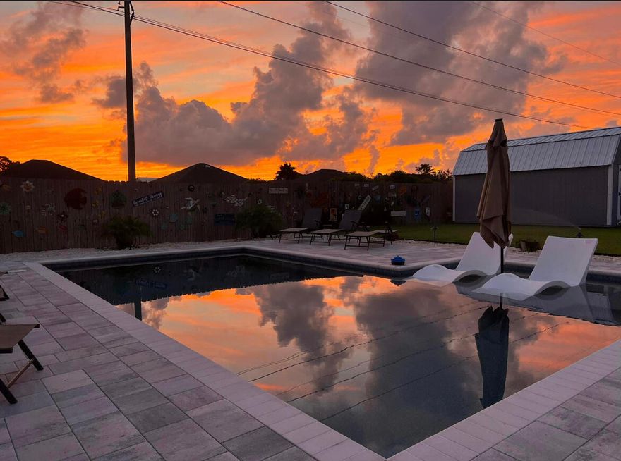his exceptional one story home, built in 2020, located on the sought after east end of Panama City Beach, just minutes from the Navy Base, Patronis Elementary, first class restaurants, Marinas and only a five minute drive to the beautiful white sand beach and emerald waters! This home has a large kitchen with granite countertops, whirlpool appliances, a farmhouse sink and a breakfast bar. The Kitchen, Dining and Living Room is part of the open floor plan, making it perfect for entertaining. There are trayed ceilings in the living area and Master Bedroom, luxury vinyl plank flooring throughout and carpet in the three bedrooms. The Master Bath has a double vanity, a glass shower door, tile flooring and a large walk-in closet and the guest bath has a tub/shower combo. There is plenty of