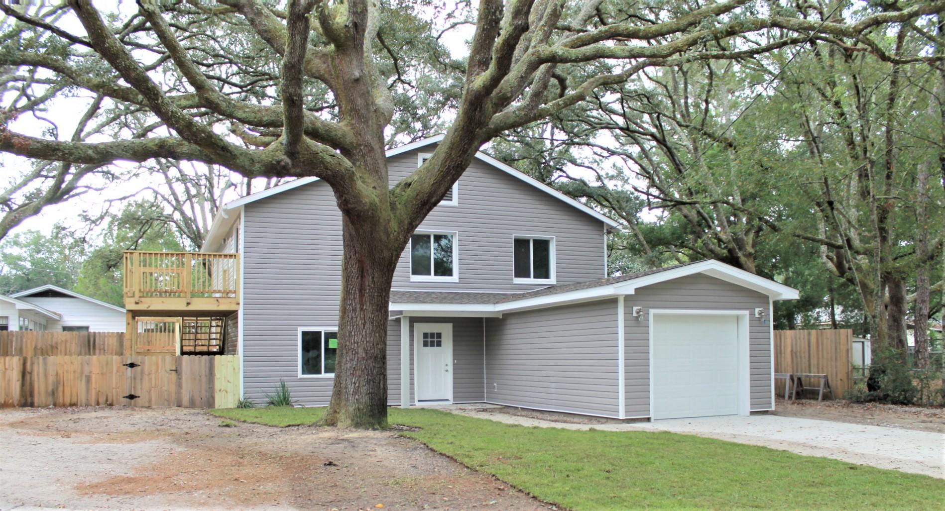 Newly remodeled and move in ready. This wonderful home is centrally to Ruckel Middle School, Niceville HS, shopping and parks. This 4 bedroom, 4 bath home has new vinyl siding, new garage,, new flooring and interior paint throughout, new sod and walk out deck to back yard. This home is complemented with ,two living areas, large family room, Rinnai Tankless Water System, great kitchen with quartz counter tops and a breakfast bar. There are two areas for stackable laundry machines, one upstairs and one downstairs. Seller has provided machines for both areas. There are also two A/C systems, one for each floor. Because of the extensive upgrades to the home, the county appraiser has changed the Effective Year of the home to 2000. Plenty of room for a boat. all, there's no H