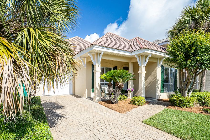 Fabulous home in the highly sought after gated beach enclave of Destiny.  If it is primo location you seek, look no farther! This beautiful one story residence is nestled in a tropical cove of lush palms and island style homes. This meticulously maintained home features a one car garage, open living area, fireplace, and a private back porch.  Vacation rentals are allowed, but there is no rental history on this home, as it has never been rented.  Conveniently located to the many neighborhood amenities and a very short distance to the Gulf of Mexico beaches!