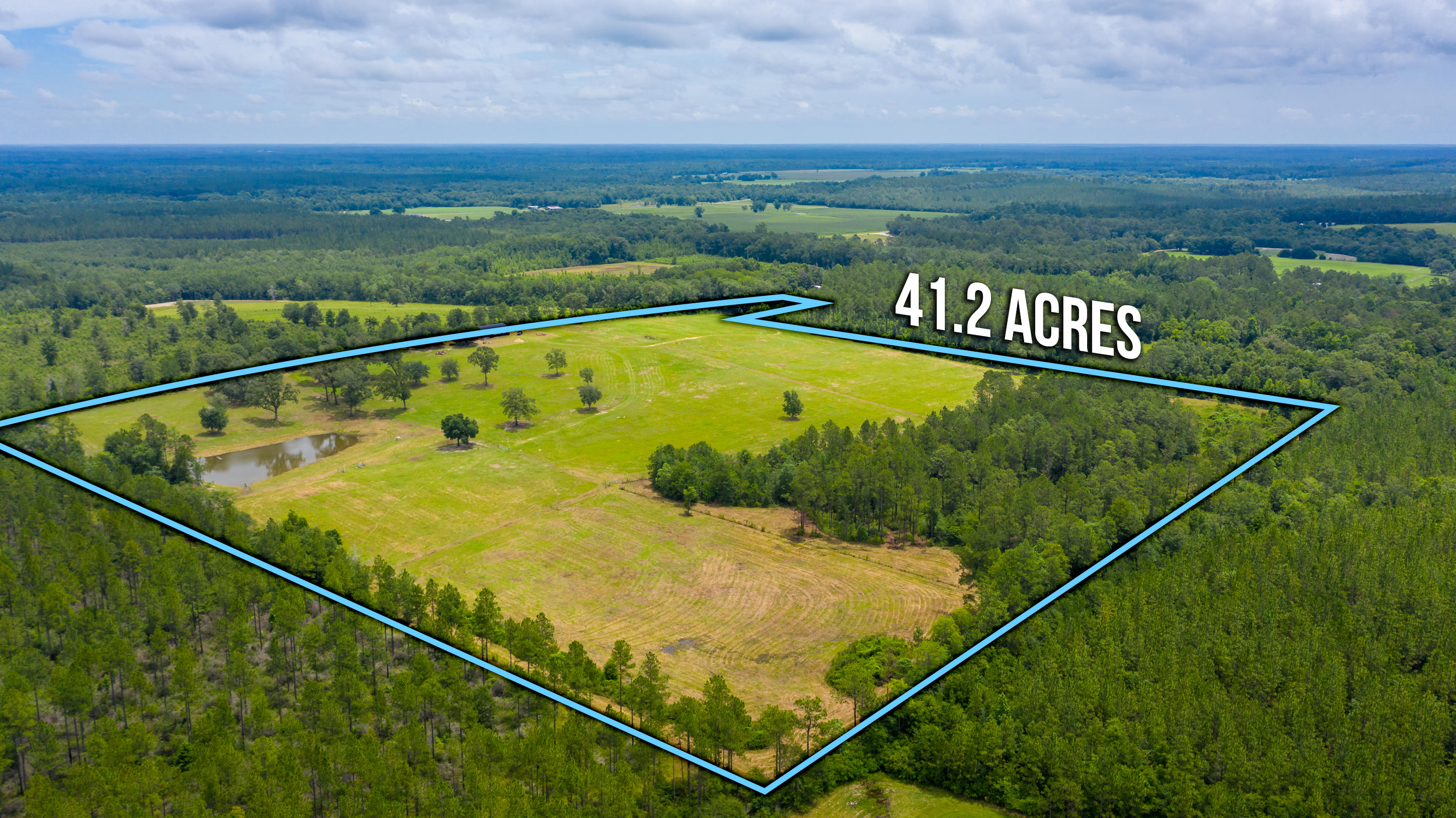 AMAZING 41 PLUS ACRES LOCATED IN THE NORTH END OF THE COUNTY. THE PROPERTY IS FENCED AND COSSED FENCED WITH PASTURE AND PERMINTER FENCING. EACH FIELD HAS IRRIGATION WATERING SYSTEM FOR LIVESTOCK. PROPERTY HAS A WELL AND POWER ALREADY IN PLACE. THE POND OFFERS GREAT FISHING AND IS STOCKED WITH CATFISH. THE BARN IS 40X60 WITH 40X36 OF IT ENCLOSED WITH WIRING AND PLUMBING PULLED AS WELL AS IMPACT WINDOWS AND ENTRY DOORS. LOOKING FOR SOMETHING SECLUDED? THIS IS PARADISE!!! BREATHTAKING VIEWS AND SUNSETS!