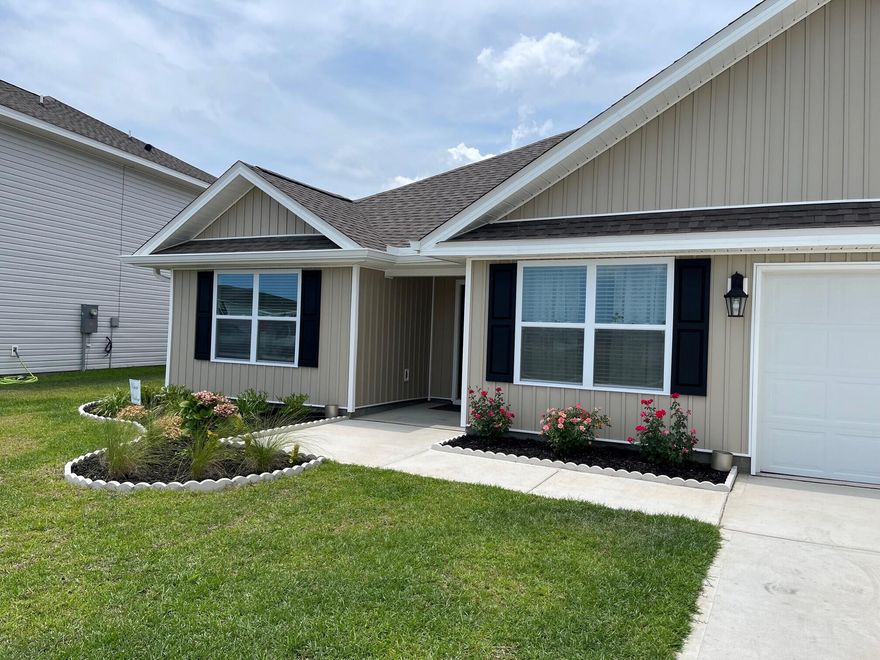 Welcome to Bridge Harbor Community to the beautiful Sawyer. The Sawyer is a beautiful floor plan with 5 bedrooms, 3 full baths and a 2-car garage. The kitchen has granite countertops, and all baths have granite countertops with over-mount sinks, with 8'-foot ceilings and beautiful white cabinetry. LVP Vinyl flooring is in the home with plush carpet in all bedrooms. The home also features Whirlpool Stainless steel appliances which include a free-standing electric range, refrigerator, dishwasher, and microwave. The home also has a washer & dryer for the tenant's use. The home has a four-sided vinyl exterior, a covered porch entry and a covered patio with a great view of the pond. The backyard is large and is partially fenced. The community also has a beautiful Community pool for relaxing