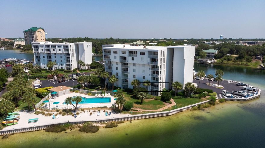 Welcome to your Destin retreat, corner unit with desirable waterfront views of the Destin harbor and pool. Completely remodeled kitchen with stainless steel appliances, titled backsplash and new cabinets. Fully tiled common areas with wood flooring in both bedrooms, and nice furnishings throughout. Each bedroom has ample living space with large closets. Tons of storage space with several built in shelving areas, linen closet, utility closet and a storage closet on the balcony. The balcony has been enclosed with glass windows to create a dry sitting area. This condo is located in Dolphin Point which offers an array of community amenities: pool, tennis courts, clubhouse, picnic tables with grills, kayak storage, harbor front beach lounge, water taxi pickup area, laundry facilities on each floor and deep water boat slips. Boat slips are sold separately or come available by rent to owners only. Also, owners have access to the Deeded Gulf beach access at the end of the street. This is a golf cart friendly community with parking available.
Included in the assessments are water, sewer, cable, wi-fi internet, pest control, and trash removal.
