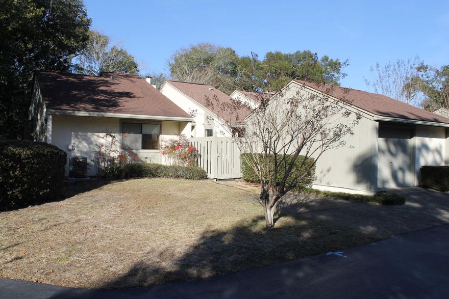 Fantastic Townhome in Bluewater Bay. Unit is in great shape. Seller has installed new stainless steel appliances and new carpet through. This End unit is complemented with a formal living area with fireplace, dining area, two patios (front and rear) study/office garage/workshop area.