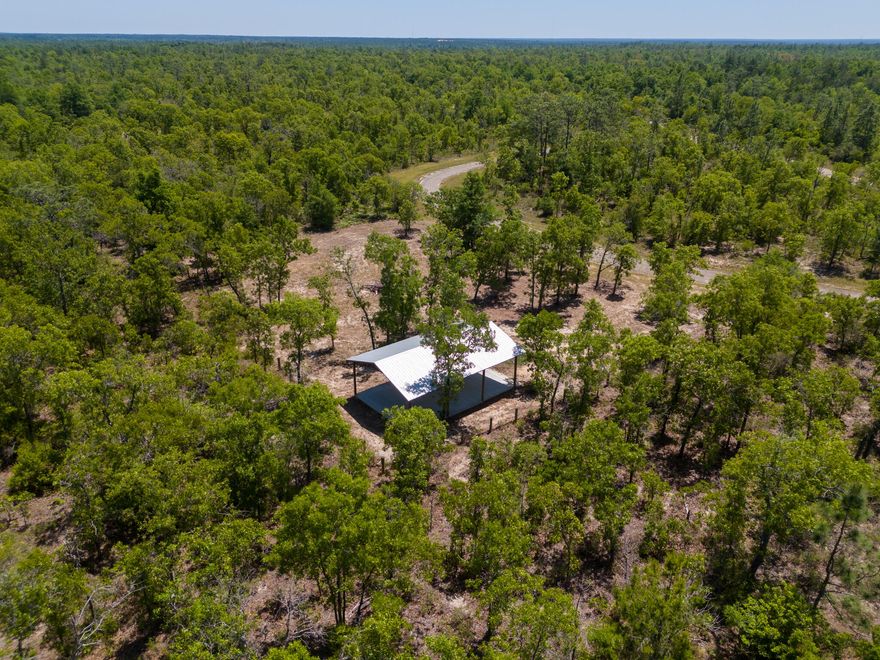This residential lot in Sunny Hills offers the perfect opportunity to build your dream home. Property is already equipped with a Pole Barn and concrete, so, you've got a head start on this blank canvas. This half -acre lot is fenced on three sides and located approximately 1.6 miles from Hwy 77. If measurements deemed important, please verify.