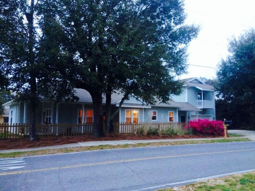 True Southern Living and charm is what you will find in this Beautiful Destin home. The main home is 1700 sq. ft. with 3 bedrooms and 2 bathrooms and above the garage is a guest apartment with the 4th bedroom, bathroom Small Kitchen and its own entrance. There are 3 entry doors to the main home. The side entry door takes you through the kitchen and as you enter a sense of WELCOME HOME comes to mind. From the tall maple cabinetry, beautiful granite countertops, tile back splash, stainless steel appliances makes this kitchen any chef's delight! Modern colors and features like 10 ft ceilings, rounded corners, crown molding, recessed lighting, tiled floors, open floor plan that flows beautifully to every room. The master suite is large with a 13x4 walk in closet  there is a jetted tub in the master bath and double vanity sinks. This truly is a beautiful home and is waiting for a new owner to call it their own.