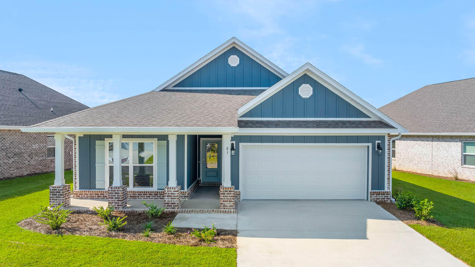 Welcome to the 80 Gray Owl Drive W, a new home at Owl's Head Farms in Freeport, Florida. This home is move in ready and has a large covered front porch. The front entry hallway leads to a light-filled open-concept living area with 9' ceilings. The kitchen impresses with quartz countertops, undermount single basin sink and a dedicated water filter faucet. stainless steel appliances, and a large center island with bar seating overlooks the great room. Brushed nickel fixtures are throughout the home and include a lifetime warranty. Adjacent to the kitchen is the dining area perfectly positioned for meals and gatherings, while the living room's wide layout invites relaxation and socializing.