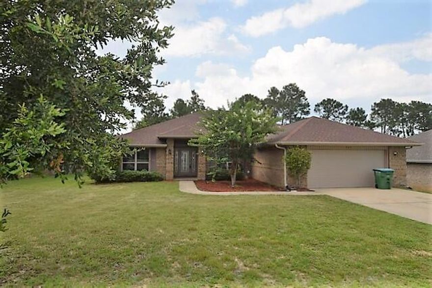 Back on the market,  no fault to seller. Motivated seller, bring all offers!  What a lovely all brick home located south of I-10!   Open concept floor plan featuring a split bedroom design with 4 bedrooms and 3 full baths.  The office located just off of the entry to the left and dining room to the right.  Huge family room has plant ledge and open site view of kitchen, dining room and breakfast nook.  Large kitchen has granite countertops, gorgeous back splash, breakfast bar, stainless steel appliances and large pantry. Laundry room is located just off of the kitchen.  The master bedroom suite has trey ceiling and French door to the lanai. The master bath suite has his and her walk-in closets, separate vanities, garden tub and separate shower.  Freshly painted interior.  Three bedrooms are