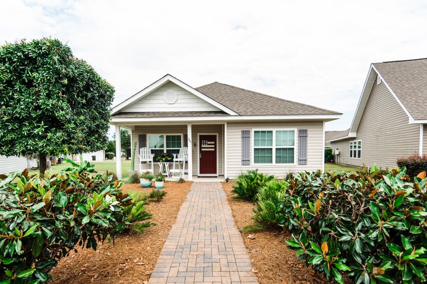 This Porter floor plan, situated in the Hammock Bay neighborhood of Schooner Landing is a charming 3-bedroom, 2-bathroom home that welcomes you with its spacious open-concept home with fresh coastal living interior paint. Featuring a large primary bedroom and two additional bedrooms, a large living room and an open concept kitchen with a large island perfect for entertaining. The ensuite primary bathroom has a shower, garden tub, double vanity, and a large walk-in closet! Enjoy your summer nights watching a beautiful sunset over 'Central Park' that boasts an outdoor kitchen and gazebo, providing the perfect setting for outdoor gatherings and events. This home offers an easy walk or bike ride to the Hammock Bay General Store or share a beverage and a bite to eat with family and friends