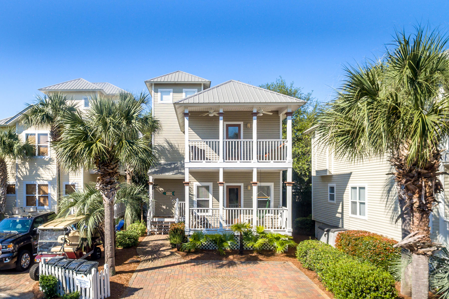 JUST REDUCED! This cozy 3-story cottage, known as ''Medallion House,'' enjoys a fabulous location south of Scenic Highway 30A, directly across from the Old Florida Cottages community pool and just a short walk or bike ride from a fully equipped walkover to the stunning Emerald Coast beach! The first floor features a master suite and 2 additional bedrooms with shared bath. The main gathering area encompasses the second floor; while the 3rd floor is a loft bedroom. Decks expand the living space to the outdoors. The pool facility includes dressing rooms and a dining area, for larger gatherings. An excellent getaway home, rental property, and/or place to retire to the sun, sand and laid-back lifestyle of the Beaches of South Walton!