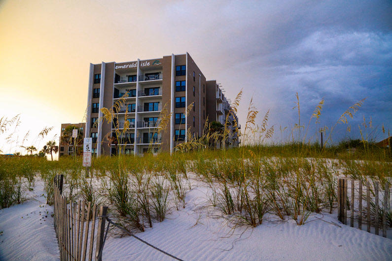 Live the island life on Okaloosa Island! Just steps to sandy white beaches on the Gulf of Mexico and minutes from restaurants, shopping, Gulfarium and fishing Piers. Lovely 2 BR/2BA gulf front condo is located on the top floor and features sweeping views of the gulf from the kitchen, dining, living area, and master bedroom. Sweeping views of the Intercoastal Waterway from your front door. Large, gulf front balcony is accessible from both the living area and master bedroom. Enjoy the beach-side pool & short stroll to the pier. Unit includes assigned parking space + separate storage room, perfect for storing beach equipment. Emerald Isle amenities include gulf front picnic area with BBQ grills, a tennis court, sundeck and a community room that can be booked for private events. Pet friendly