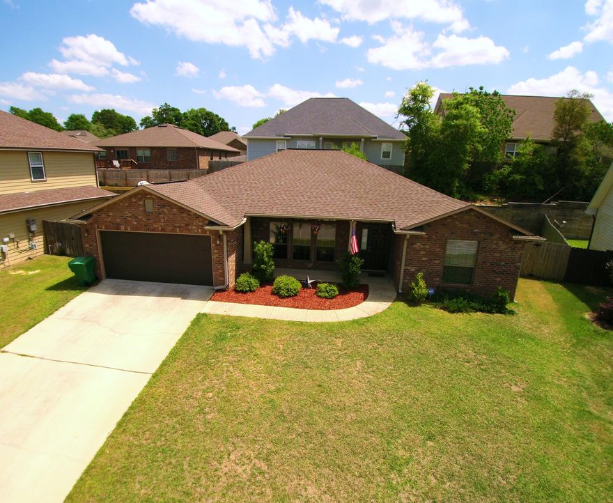 MAJOR PRICE REDUCTION!! BEAUTIFUL BRICK HOME IN THE DESIRABLE DUGGAND POND SUBDIVISION WITHIN 10 MINUTES TO DUKE FIELD. FROM THE MOMENT YOU WALK THROUGH THE FRONT DOOR THIS HOME WELCOMES YOU WITH OPEN ARMS. 3 BEDROOM 2 BATH WITH A 4TH BONUS ROOM AND A OVERSIZED UPSCALE KITCHEN WITH ISLAND, GRANITE COUNTERTOPS,PREMIUM WOOD CABINETS AND STAINLESS STEEL APPLIANCES. NEWLY UPDATED LAMINATE WOOD FLOORING THROUGHOUT THE HOME WHICH LEADS TO THE SPACIOUS LIVING ROOM. MASTER BATHROOM OFFERS A SEPERATE SHOWER AND GARDEN TUB WITH A DOUBLE VANITY SINK AND HUGE WALK IN CLOSET. THIS HOME IS PRICED TO SELL AND WONT LAST LONG.LOCATED IN THE TOP RATED ANTIOCH ELEMENTARY SCHOOL ZONE AND BEING THE CLOSEST SUBDIVISION TO DUKE FIELD MAKES THIS PROPERTY VERY DESIRABLE FOR THOSE LOOKING FOR A QUICK COMMUTE TO WO