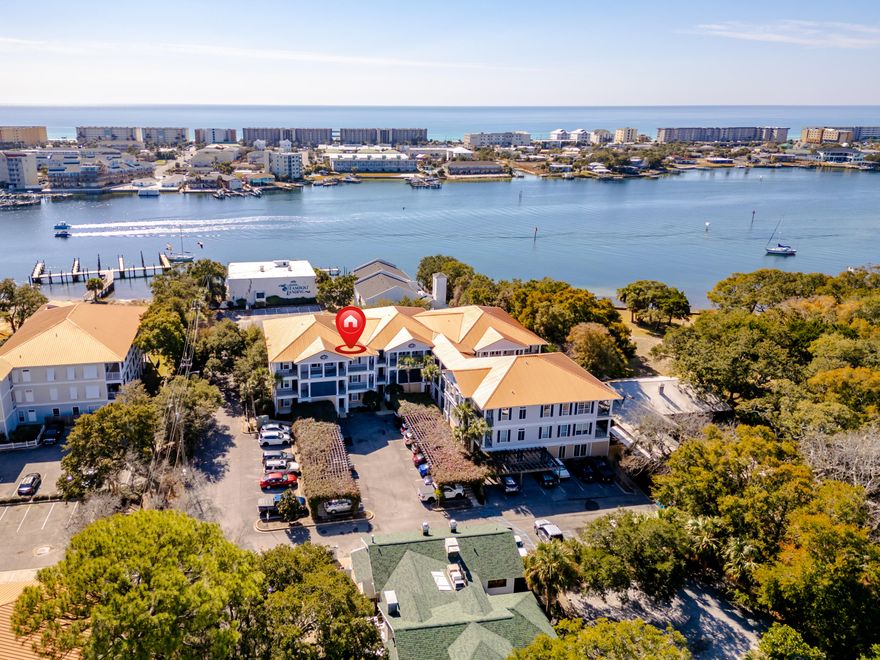 Welcome to this spacious French Quarters condo, perfectly situated in downtown Fort Walton Beach! This gem features 3 bedrooms, deeded water access, and Santa Rosa Sound views from the balcony accessible from both the living room and master bedroom! The bright, open-concept design includes a split floor plan, fresh paint, orange peel 9' ceilings with crown molding, and LVP flooring. Enjoy comforts with a brand-new HVAC system, metal roof, and included washer/dryer. This pet-friendly community offers dedicated gym space and your very own temperature-controlled storage unit. Ideal as a primary residence or mid-term rental, you're moments from Fort Walton Beach Landing Park, restaurants, bars, and more. Discover the ultimate coastal living experience in this move-in-ready condo!