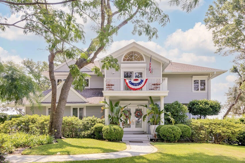 Waterfront estate in Shalimar Pointe!This home was completely updated in 2018 with no expense spared, including a new roof, weather guard paint with 25 yr warranty, 3 new air conditioning units, de-humidifier, heat pump, sprayed foam insulation, new windows plus full cosmetic upgrades!Almost 5000 sq. ft on two stories with expansive water views from both floors.A solid wood staircase, leads up to a great master suite, with a bonus reading room or study, with a sunroom catwalk with a wet bar.The Westside of the property features brand new docks as well, with 2 covered boat slips with lifts, on deepwater sheltered from the bay.This property has been maintained to the highest level.The landscaping and classic lines of this home give it amazing curb appeal.