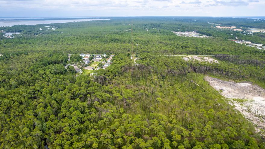 Great Investment Opportunity!  Current Site Plan Is A Builders Dream Reflecting A 34 Homesite Community.   This Property Is Just Under 6 Acres & Is Located In The Heart Of Santa Rosa Beach.   Within A Mile, You Will Find The Best Dining And Shopping That The Amazing Emerald Coast Is Known For!  In Addition, You Are Just A Few Minutes Away From The Beautiful Emerald Waters Of The Gulf Coast.  This Property Is Categorized As A Neighborhood Planning Area (NPA) With Land Use As Infill Development (IF).   A Conservation Easement Survey & Environmental Assessment Has Been Performed.  The Property Has A 33 Ft X 663 Ft Easement Connecting to Goldsby Road.  Come By & Take A Look At This Amazing Property.
