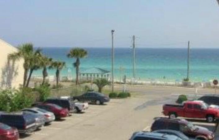 You'll love this top floor unit with Vaulted Ceilings and Gulfviews!! Great rental with great 'Beachy' decor! The unit feels spacious light and bright. There are hall bunks and the unit sleeps 6. Convenient location to the deeded beach access directly across the street, the Pool, Destin shopping, dining, attractions, music and more! Comes fully furnished and rental ready! Aggressively managed by Vacasa and available to view on most weekends between rentals. Your beach get away is here! Just steps to your own private beach access! Gross $25k 2019 $27k 2020 YTD $24k
