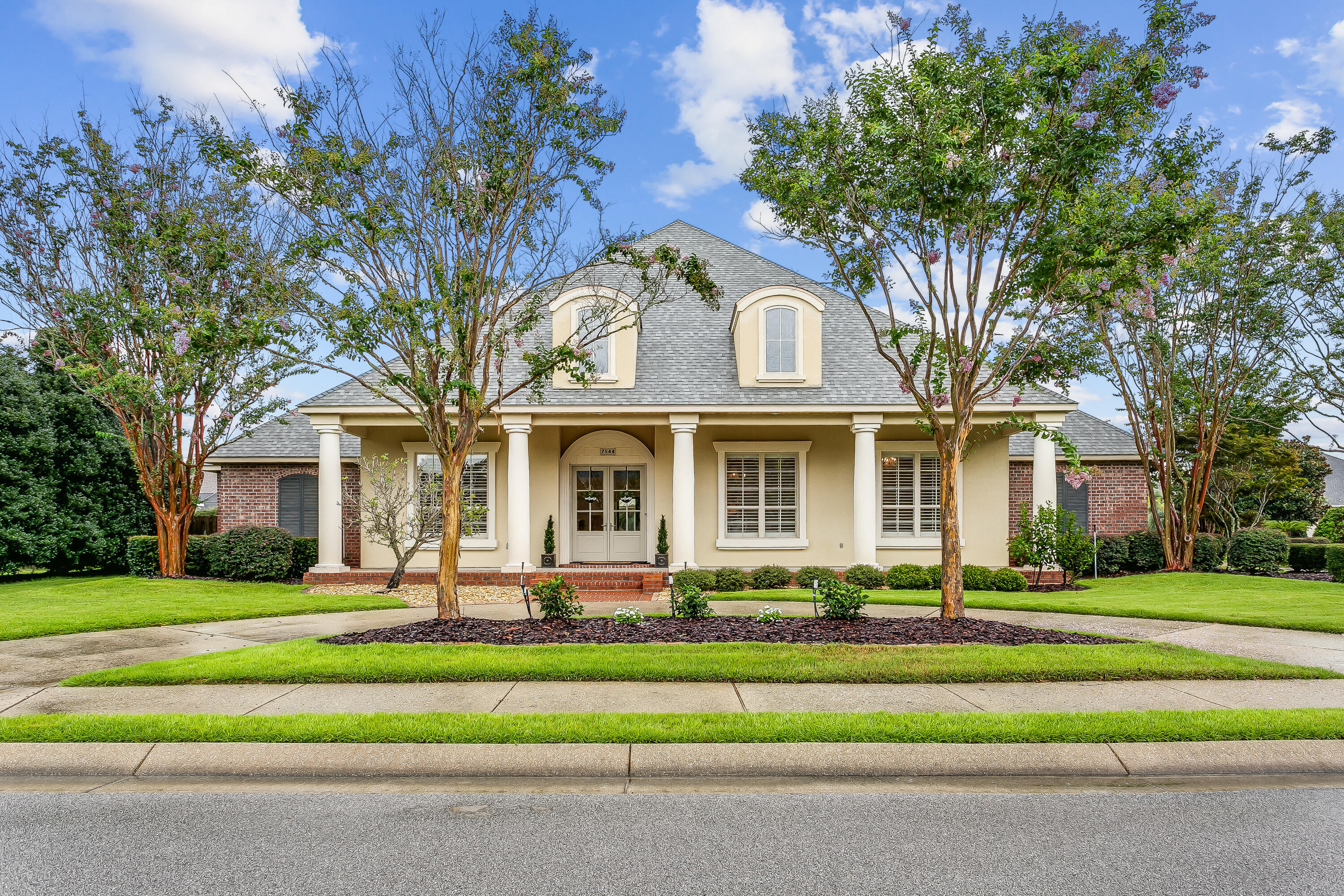 Stunning estate on a corner lot in Grand Pointe with all designer upgrades. This home has it all, a fully updated kitchen in 2020 with Wolf double oven, gas cooktop, microwave drawer, Subzero refrigerator, solid wood cabinets and quartzite countertops. The pantry has a Wolf wine cooler and an icemaker. The kitchen features brick flooring that flows into the den that was part of a 2010 addition. This home has 4 large bedrooms and an office with a built in desk and cabinetry. The main suite has a sitting area, fireplace, two walkin closets, a safe room, and access to the gorgeous backyard that is an entertainers dream. In the backyard you will find a gazebo, brick cooking station, fireplace, and large gunite heated spa. The heated/cooled 3 car garage has stairs to abundant attic storage.