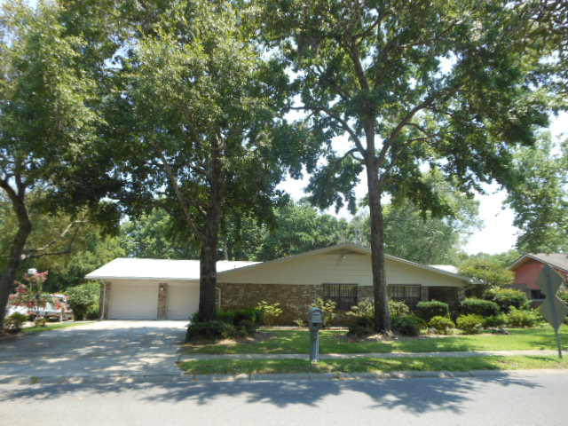 Custom built home located in the popular Overbrook neighborhood with easy access to both bases, schools, shopping and entertainment. The house has a well executed floor plan with spacious rooms and is situated on a large lot. The kitchen was completely remodeled in 2009. The cabinets and counter tops are color coordinated and blend in with the new tile flooring. The cabinets are Manhattan Maple and the color is medium Pewter Blaze. The color of the counter tops is Pebble Maize. The cabinets have lots of storage to include pull out drawers in the lower cabinets and a lazy Susan in the corner cabinet. The center island has running water, a pull out trash receptacle and pull out storage. There is a water filtration system in the kitchen. The breakfast bar overlooks the living area.