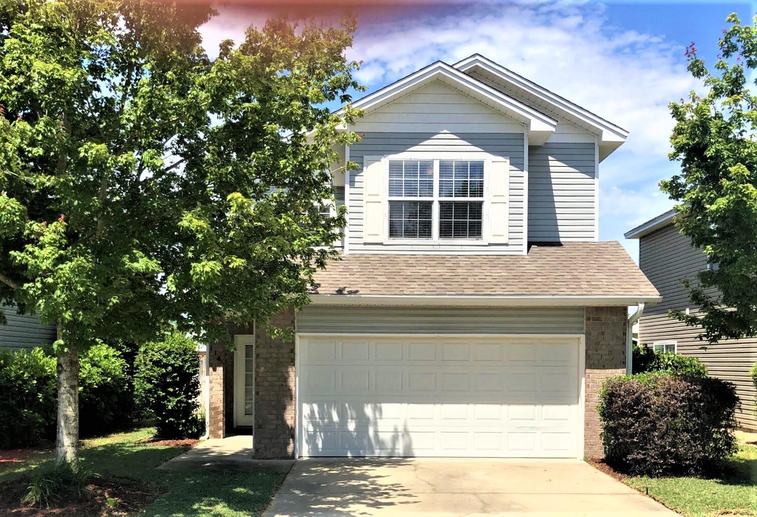 Beautiful and move in ready, this 3 bedroom, 2.5 bath home is close to the both bases, the best schools in the County, Shopping, Golf, and approximately 7 miles to the beautiful beaches of Destin. The kitchen is accented with tile floors, dark wood cabinetry, stainless appliances, granite counter tops, breakfast bar and dining area. The large open family room has carpeted floors with a large storage area under the stairwell. There is also a 1/2 bath downstairs. Large master bedroom and master bath with cultured marble dual sinks, walk-in closet with separate garden tub, shower and ceramic tile. The two additional bedrooms are large in size and share the additional bath. Washer and Dryer convey. New sod in font and back yard.