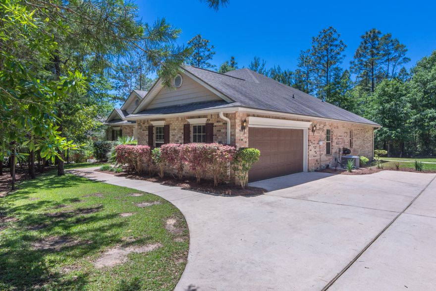 Entertaining dream home, minutes to the new Publix Shopping Center! This Crestview property delivers both inside and out. Large lot (.61 acre) in upscale, military friendly neighborhood offers privacy and proximity to schools and shopping. On the inside, you will find the finest upgrades--granite throughout, tile flooring with detailed accent pieces, recessed lighting, top of the line Bosch appliances (complete with a wine fridge), surround sound wiring, crown molding--no upgrade was spared here! The popular open concept style floor plan provides a large kitchen, perfect for entertaining.The backyard is picturesque and features a brick oven, outdoor sink/prep area, and pergola covered patio. Master bathroom area is spa-like,w/separate dual vanities, garden soaking tub, and tile shower.