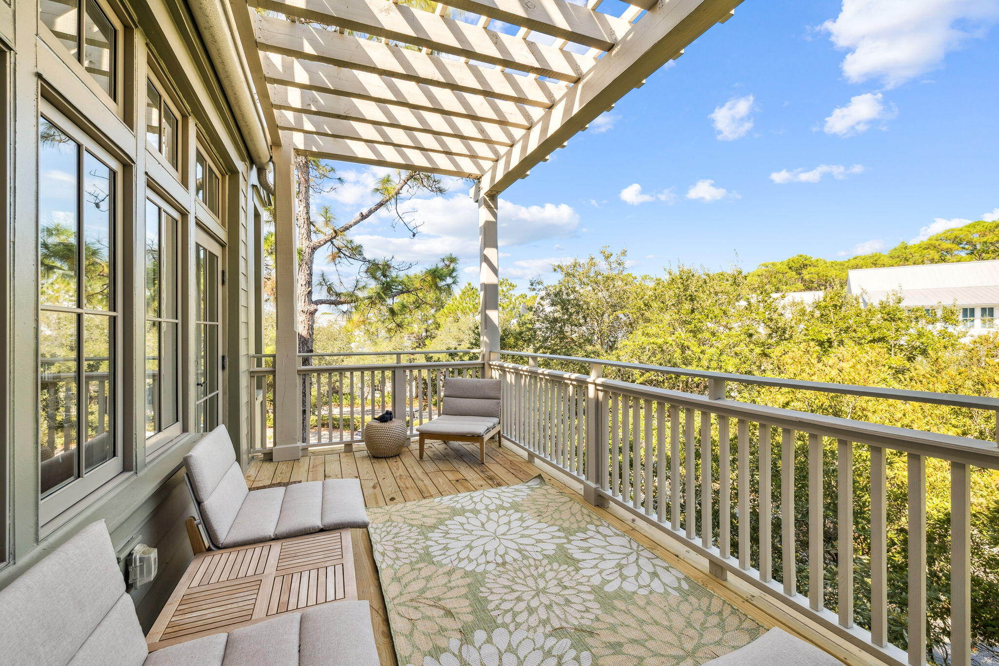 The only beachside one-bedroom, two-bath residence in Watercolor's sought-after Beach District. A rare find in the heart of 30A, this multi-level condominium spans the top two floors and offers exceptional privacy, two balconies, and sweeping treetop views, all just steps from the Beach Club, Gulf-front pools, dining, and boutique shops.The first level opens to a bright, expansive living and dining space wrapped in floor-to-ceiling windows. Natural light floods the interiors, creating a welcoming environment that blends seamlessly with the outdoors. The living area provides flexible accommodations, easily transforming into additional sleeping space for guests, while the adjoining balcony invites morning coffee or evening relaxation in the coastal air. The dining space comfortably... ...seats six, anchored by a kitchen thoughtfully outfitted with Bosch, Caf??, and GE appliances, blending quality, efficiency, and design for effortless entertaining.
Ascending to the second floor, the primary suite becomes a retreat unto itself. Perched above the treetops, this private sanctuary features its own balcony with sweeping sunset views. the perfect vantage point to close the day with a cocktail in hand. With its elevated position and sense of seclusion, the suite captures the essence of refined coastal living.
Beyond the residence, owners enjoy access to Watercolor's exceptional amenities, including six resort-style pools, a private beach club with Gulf-front dining, tennis and pickleball courts, a state-of-the-art fitness center, and a vibrant town center filled with shops and restaurants. Scenic biking and walking trails wind throughout the community, connecting residents to Western Lake, lush green spaces, and the natural beauty that defines Watercolor.
Blending a prime location with privacy, design, and world-class amenities, this residence offers a rare opportunity to experience the best of coastal living along 30A.