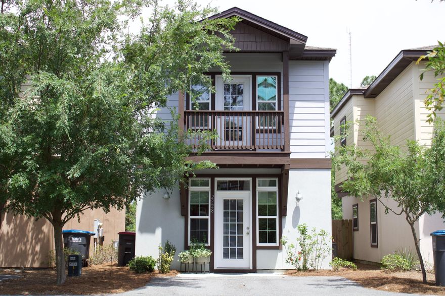 Back on Market- no fault of seller! This charming home is perfectly situated in the quant community of Mimosa Place.  Conveniently located just minutes form the sugar white sand beaches as well as a variety of dining and shopping destinations.  This three-bedroom home encompasses two levels of over 1,500 square feet of thoughtfully designed living space.  The main living area features open concept living with a seamless transition into the well-equipped kitchen that offers a breakfast bar, granite counter tops, stainless steel appliances and a walk-in pantry.  Second floor features a large master bedroom with walk-in closet and two nicely sized additional bedrooms.  The front bedroom includes a balcony for added outdoor enjoyment.  The neighborhood has a shared gazebo and grilling area.