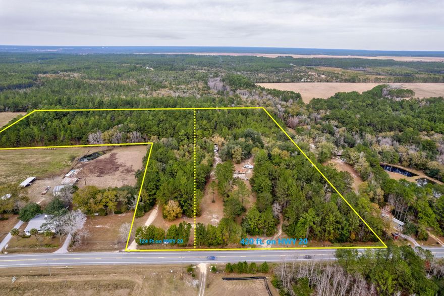 72 HOUR KICKOUT CLAUSE in place. Incredible investment opportunity for an exciting development along Highway 20 in Freeport. Boasting 398 feet of highway frontage, this property is situated approximately 4 miles east of the HWY 331 intersection. This exceptional property, marked by a historic 1937 homestead and was once the home of the Clemmons Bar, presents a unique chance for development amidst the ongoing growth and expansion in the area. A gorgeous pole barn that is 40 x 60 with slab, electric and water for your RV or boats or other toys.  Deep water well is present as well for your water.  The mobile home on the property has no value. The additional property to the left is also for sale, MLS 949417.  They also can be purchased together. Research is readily available to include; a completed environmental study, survey, and a rendering of a 171-space RV resort that would be an incredible addition to this beautiful town.

A couple of reference points for proximities:
Pier Park in Panama City Beach is 29.7 miles.
Silver Sands Outlet in Miramar Beach is 23.1 miles. Seaside Florida is 18.1 miles.