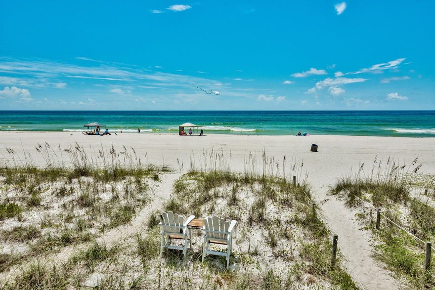 Magnificent opportunity to purchase a gulf front town home on the far west end of Panama City Beach, Florida with no HOA fees and an enclosed garage! This is a rare find and pricing on properties like this will soon be gone for good. The property at 22513 Front Beach Road is the western end unit of the development and offers incredible views from the downstairs kitchen & living area as well as the master bedroom on the second level. The property is in excellent shape and boasts an entirely renovated kitchen. The first floor features a guest bedroom and full bath, laundry room, kitchen, dining and living space with access to a large open deck affording perfect views and stairwell down to the beach.