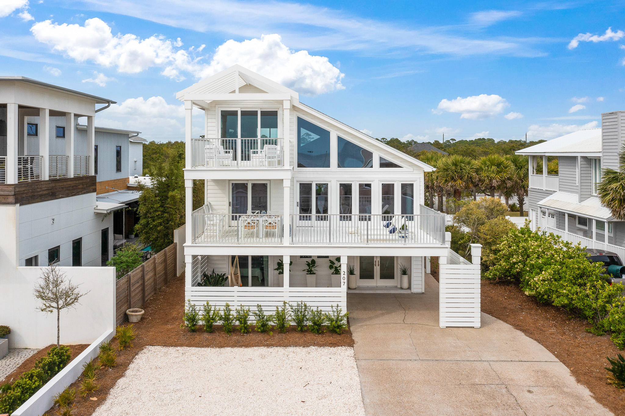 Hidden jewel on 30a! This non-rental neighborhood sits immediately adjacent to Alys Beach yet maintains that quiet old Florida charm that is so rare these days.  Home was completely gutted and renovated to capture the stunning Gulf views from all three floors. Pecky cypress ceilings accentuate and add interest to the elegant white decor. Vaulted ceilings in the master suite and pebble tile detailing in guest baths are just a few things that make this home so unique. Sit on the second or third floor balconies and take in the direct ocean breeze or hang out by the gas firepit in the large, scrub oak lined backyard (with plenty of room for a pool addition). The private beach is second to none, and the neighborhood access boardwalk is only steps from your front door.