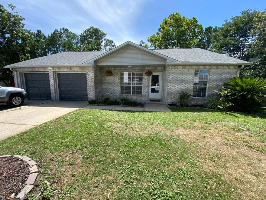 This adorable home has undergone an HGTV style renovation! The home is conveniently located only 7 miles from Hurlburt Base! The spacious, fenced in back yard features an 8ft privacy fence, storage shed, grape vine trellis, AND a screened in rear porch with new fan/fixture. The paved grilling area and fire pit are great additions to the backyard. New interior additions include: new stainless steel appliances with an awesome focal point of a chef style industrial hood, new granite countertops, new kitchen cabinets, new backsplash accent, new wood plank tile in all common areas and bathrooms, new 5'' baseboard, new paint, new barn door in master bedroom, newer HVAC system, new bathroom fixtures, new bathroom vanities, and new toilets. The roof is only 1 year old! If you don't want to sit in