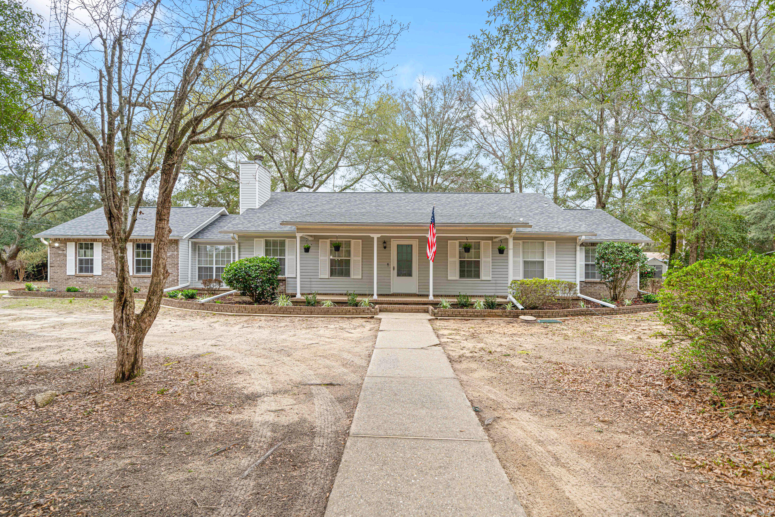 Updated Home on Over an Acre in CrestviewDiscover the perfect blend of modern updates and country charm at 6004 Donald Guy Road, where peaceful living meets stylish comfort on over an acre of land. This inviting three-bedroom, two-bath home also includes a flex room that could easily be converted into a fourth bedroom, offering a spacious layout, thoughtful upgrades, and an expansive outdoor retreat, perfect for relaxation and entertaining.Bright and Inviting InteriorStep inside to find a welcoming space with fresh paint, all-new wall-to-wall carpeting in the bedrooms, new luxury vinyl plank flooring in the main living areas, and all-new upgraded lighting with ceiling fans that are remote-controlled for added convenience. The open-concept living and dining area is centered around a charming fireplace, creating the perfect ambiance for cozy nights in or hosting guests.
The kitchen has been refreshed with quartz countertops, a modern backsplash, refinished cabinetry painted in Ultra White with new hardware, and stainless steel appliances, including a microwave and smooth glass-top stove. A brand-new sink and faucet add to the kitchen's functionality and contemporary appeal.
Both bathrooms have been updated with new vanities, quartz countertops, undermount sinks, modern fixtures, and upgraded toilets. The hallway bath also includes a new shower head, while the primary ensuite provides a peaceful retreat. Additional updates throughout the home include new outlet covers, smoke detectors, and a freshly painted garage floor. The back French doors now feature built-in blinds for added convenience.
Spacious Outdoor Living
The private yet quaint fully fenced backyard that spans half the home offers plenty of space for outdoor activities, pets, and relaxation. The above-ground pool, complete with a brand-new pump and filter, is perfect for cooling off on warm summer days. Whether you're hosting gatherings by the pool, enjoying quiet mornings surrounded by nature, or parking your boat or RV for weekend adventures, this home is designed to fit your lifestyle.
The expansive lot provides ample parking for a boat, RV, or camper, with the added bonus of an on-site RV hookup. The exterior has been pressure-washed, including the trim and soffits, while newly installed solar lights enhance curb appeal. Fresh landscaping completes the inviting outdoor space.
Move-In Ready with Major System Updates
Designed for comfort and peace of mind, this home features a 2021 roof, a brand-new exterior HVAC unit with a serviced interior unit, a 2014 water heater, and a new garage door carriage light for improved visibility. The oversized garage offers space for two cars plus an ATV or small boat, making it ideal for extra storage or outdoor enthusiasts.
Prime Location with Country Charm
Located in one of Crestview's most desirable areas, this home offers a perfect balance of privacy and accessibility. Enjoy a peaceful, rural atmosphere while still being just minutes from shopping, dining, schools, convenient location. This home is also just twenty minutes from Eglin Air force base.
Schedule Your Showing Today
Homes with modern updates and over an acre of land are rare in Crestview. Don't miss this opportunity to own a home that offers both charm and convenience. Call today to schedule your private tour before it's gone!