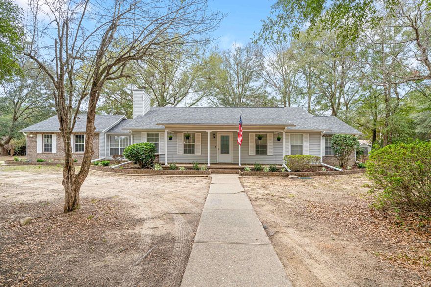 Updated Home on Over an Acre in CrestviewDiscover the perfect blend of modern updates and country charm at 6004 Donald Guy Road, where peaceful living meets stylish comfort on over an acre of land. This inviting three-bedroom, two-bath home also includes a flex room that could easily be converted into a fourth bedroom, offering a spacious layout, thoughtful upgrades, and an expansive outdoor retreat, perfect for relaxation and entertaining.Bright and Inviting InteriorStep inside to find a welcoming space with fresh paint, all-new wall-to-wall carpeting in the bedrooms, new luxury vinyl plank flooring in the main living areas, and all-new upgraded lighting with ceiling fans that are remote-controlled for added convenience. The open-concept living and dining area is centered around a charming fireplace, creating the perfect ambiance for cozy nights in or hosting guests.

The kitchen has been refreshed with quartz countertops, a modern backsplash, refinished cabinetry painted in Ultra White with new hardware, and stainless steel appliances, including a microwave and smooth glass-top stove. A brand-new sink and faucet add to the kitchen's functionality and contemporary appeal.

Both bathrooms have been updated with new vanities, quartz countertops, undermount sinks, modern fixtures, and upgraded toilets. The hallway bath also includes a new shower head, while the primary ensuite provides a peaceful retreat. Additional updates throughout the home include new outlet covers, smoke detectors, and a freshly painted garage floor. The back French doors now feature built-in blinds for added convenience.

Spacious Outdoor Living
The private yet quaint fully fenced backyard that spans half the home offers plenty of space for outdoor activities, pets, and relaxation. The above-ground pool, complete with a brand-new pump and filter, is perfect for cooling off on warm summer days. Whether you're hosting gatherings by the pool, enjoying quiet mornings surrounded by nature, or parking your boat or RV for weekend adventures, this home is designed to fit your lifestyle.

The expansive lot provides ample parking for a boat, RV, or camper, with the added bonus of an on-site RV hookup. The exterior has been pressure-washed, including the trim and soffits, while newly installed solar lights enhance curb appeal. Fresh landscaping completes the inviting outdoor space.

Move-In Ready with Major System Updates
Designed for comfort and peace of mind, this home features a 2021 roof, a brand-new exterior HVAC unit with a serviced interior unit, a 2014 water heater, and a new garage door carriage light for improved visibility. The oversized garage offers space for two cars plus an ATV or small boat, making it ideal for extra storage or outdoor enthusiasts.

Prime Location with Country Charm
Located in one of Crestview's most desirable areas, this home offers a perfect balance of privacy and accessibility. Enjoy a peaceful, rural atmosphere while still being just minutes  from shopping, dining, schools, convenient location. This home is also just twenty minutes from Eglin Air force base. 

Schedule Your Showing Today
Homes with modern updates and over an acre of land are rare in Crestview. Don't miss this opportunity to own a home that offers both charm and convenience. Call today to schedule your private tour before it's gone!