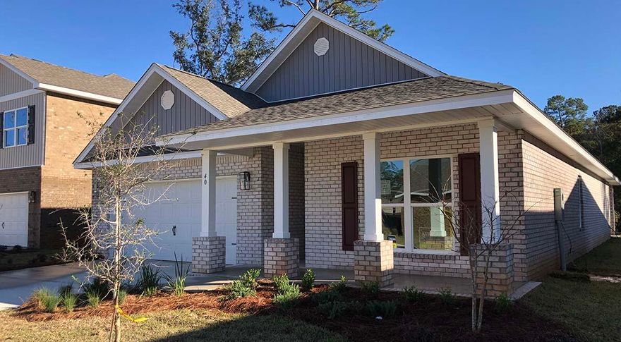 Price reduced for a limited time! The Delray is a 4 bed, 2 bath, 2 car garage plan. Standard features of this home include 9' ceilings, EVP flooring throughout the common areas and carpet in all bedrooms. Stainless steel Whirlpool appliances include a free-standing smooth top range, microwave/hood, and dishwasher. Beautiful painted shaker style cabinetry is in the kitchen and bathrooms. As you walk into the home you will be greeted with two bedrooms that share one full bathroom. The laundry room is spacious and offers plenty of storage if needed. There is a fourth bedroom that can also be used as an office space/ flex room/ bedroom next to the laundry room. Continuing down the foyer, you will walk into a bright, spacious open concept dining, living and kitchen.