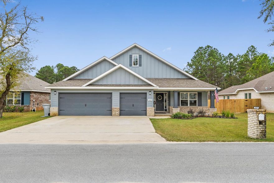 *Sellers will be paying off the Tesla solar panels in full at closing!* Better than new!! Welcome home to this absolutely stunning open floor plan 4 bedroom/2.5 bathroom Whitworth Builders property that's only a few years old, but with a long list of fantastic seller upgrades. Pull up to the house and appreciate the oversized parking along with a 3 car garage. The well cared for lawn leads to updated landscaping an inviting covered front porch. Inside you'll find a lovely entry way where the luxury vinyl plank flooring extends throughout. The first bedroom has newly installed carpet with an upgraded pad and a nice sized closet. As you continue walking you'll come to the large dining room space that's open to the expansive living room featuring double trey ceilings and high end custom Bally blinds on all windows. In the kitchen you'll find a stunning space full of updates - nothing is standard builder grade here! The massive kitchen island was completely rebuilt and expanded with a brand new granite slab, custom gray shiplap, as well as a new farmhouse sink and all new hardware underneath the drop down pendant lighting. ALL the appliances have been replaced with high end Kitchen Aid appliances, and the walk in pantry has an adorable glass door with custom built ins. You will find all new interior lighting, as well as replaced and upgraded hardware on every fixture throughout the entire home. The master suite is an oasis with an enormous bedroom, with a large walk in closet with custom built ins, as well as a master bath retreat with all the features you're looking for to relax after a long day. There is a double vanity, soaking tub with upgrades fixtures and a sprayer, a private water closet, separate linen closet, and a gorgeous and huge walk in tiled shower with two shower heads. The other two bedrooms feature nice sized closets with a shared full bathroom between then. The separate laundry room has additional cabinetry and a folding station with a granite counter. Before you walk into the large 3 car garage you'll find a drop zone with cabinets and plenty of space for storage. Back inside as you walk to the back patio you'll pass a half bathroom, and outside you'll love relaxing and enjoying the stunning and secluded view on the screened in patio. The front and backyards are both full irrigated, and the backyard is full fenced in. Tesla solar panels have been installed and the sellers will be paying them off in full at closing. Don't hesitate to make this your new home!